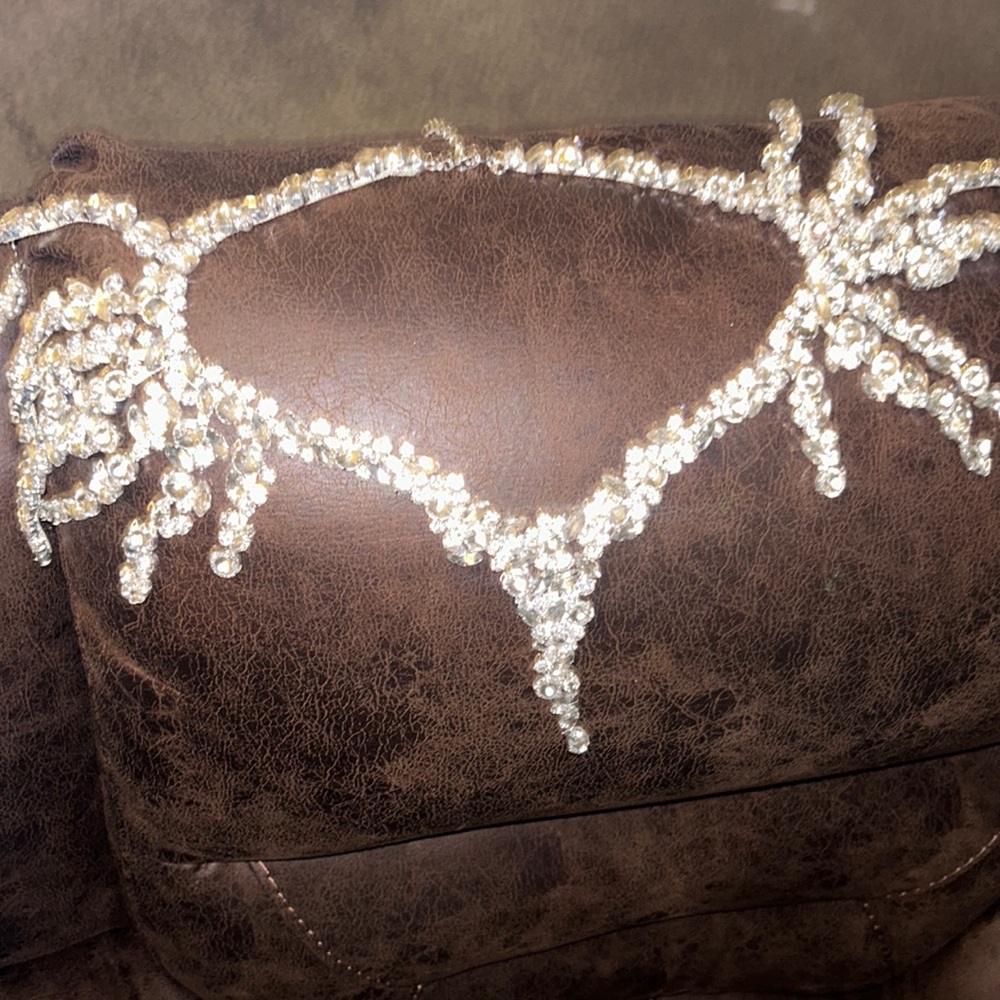 A shoulder and neck piece of jewelry